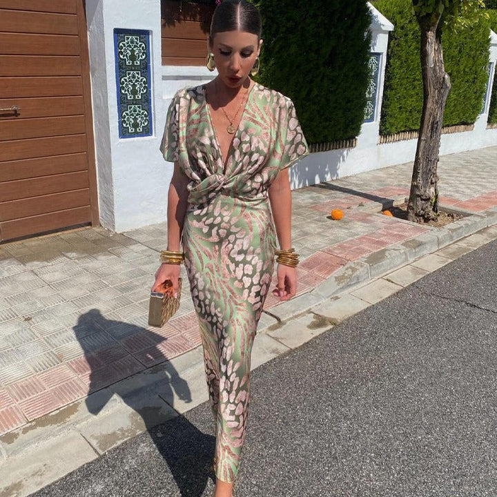 Kelsey - Long dress with V-neck and twisted detail